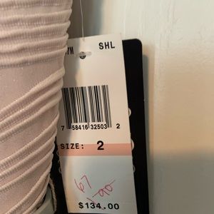 Plush cocktail dress. Silver belt at waist